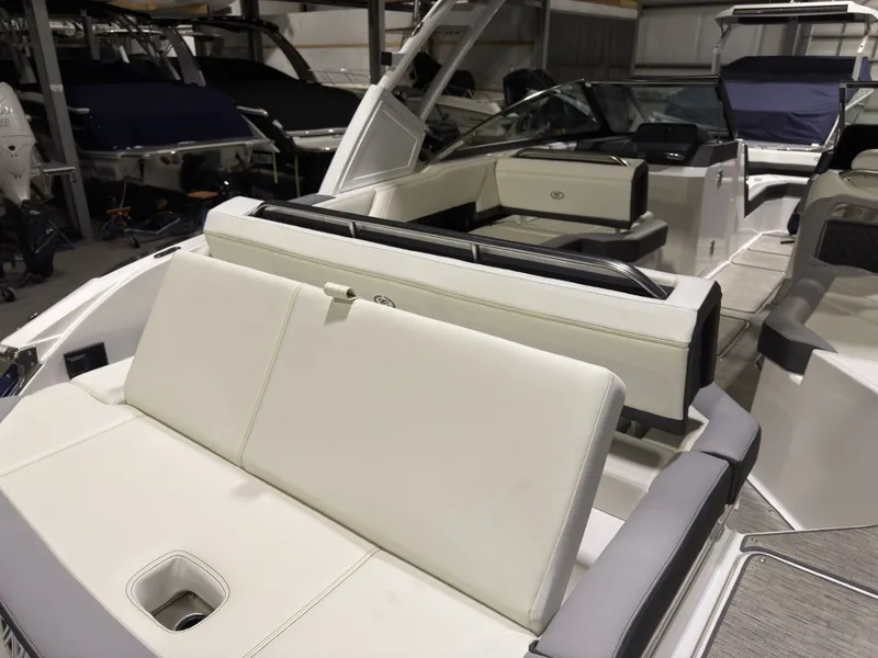 Slide: The Image of Interior of a 2022 Cobalt R6 boat with white seating. - 22