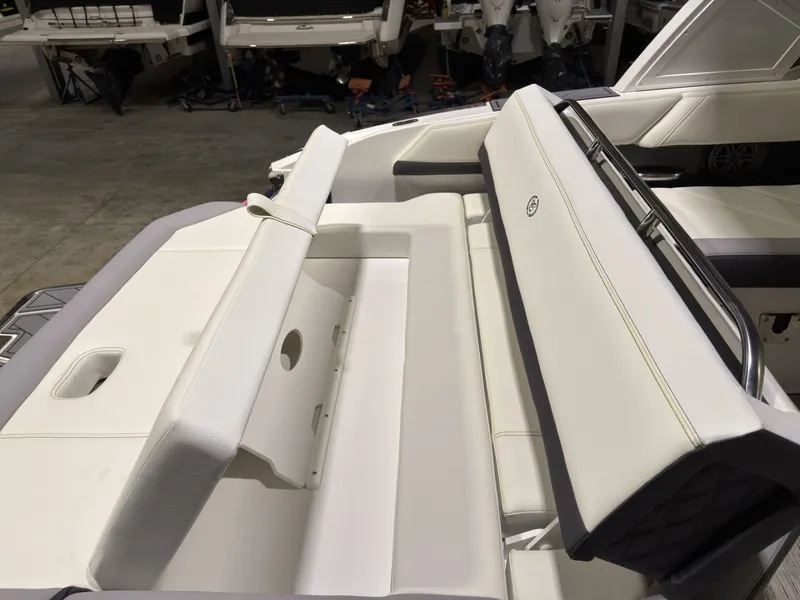 Slide: The Image of Interior of a 2022 Cobalt R6 boat with white seating. - 23