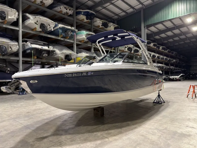 Slide: The Image of 2022 Cobalt R6 boat in storage facility, side view. - 3