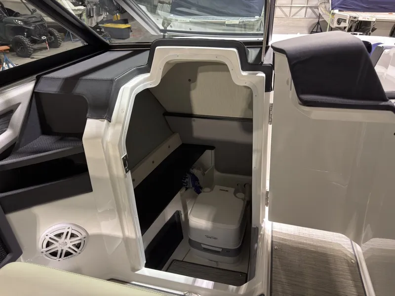 Slide: The Image of Interior of a 2022 Cobalt R6 featuring a toilet and seating area. - 34