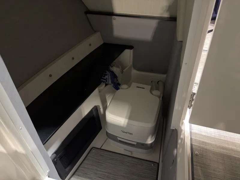Slide: The Image of Interior of a 2022 Cobalt R6 featuring a portable toilet. - 35