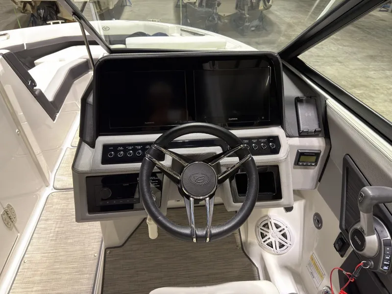 Slide: The Image of Interior view of a 2022 Cobalt R6 boat cockpit. - 36