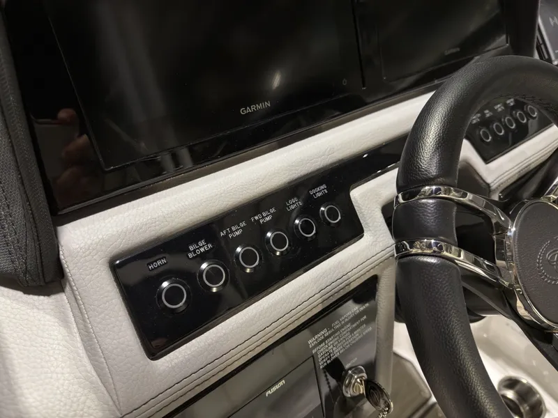 Slide: The Image of Dashboard of a 2022 Cobalt R6 with Garmin display and controls. - 37