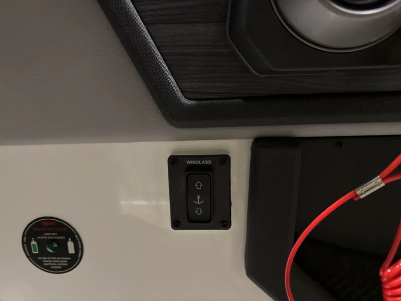 Slide: The Image of 2022 Cobalt R6 boat windlass switch and indicator light. - 40