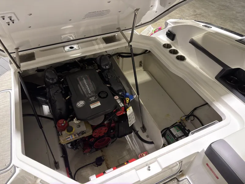 Slide: The Image of Engine compartment of a 2022 Cobalt R6 boat with open hatch. - 47