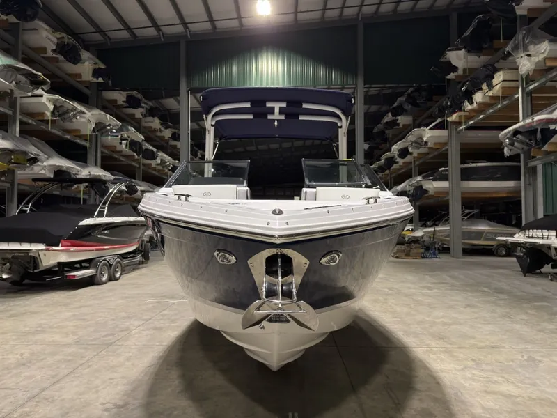 Slide: The Image of 2022 Cobalt R6 boat in storage facility, front view. - 6