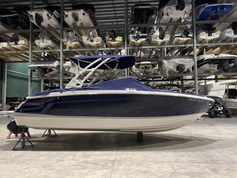 Slide: The Image of 2022 Cobalt R6 boat in storage facility, side view. - 8