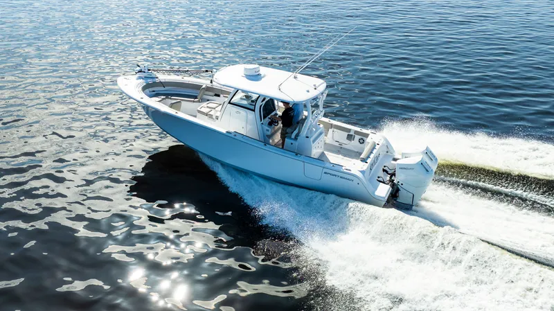 Slide: The Image of 2024 Sportsman Open 322 Center Console on the water. - 11