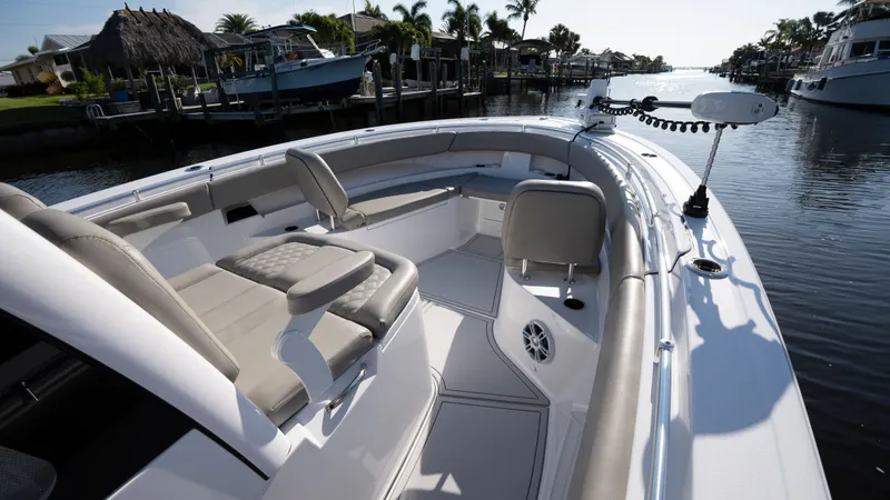 Slide: The Image of 2024 Sportsman Open 322 Center Console on calm waters. - 14