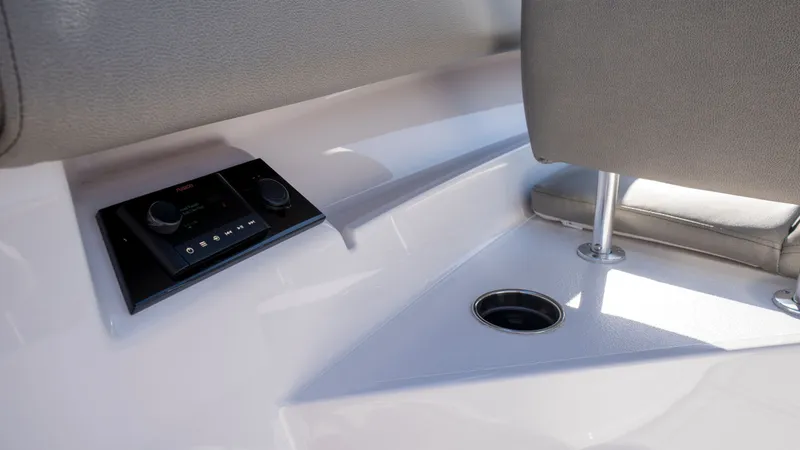 Slide: The Image of 2024 Sportsman Open 322 Center Console interior with controls and seating. - 15