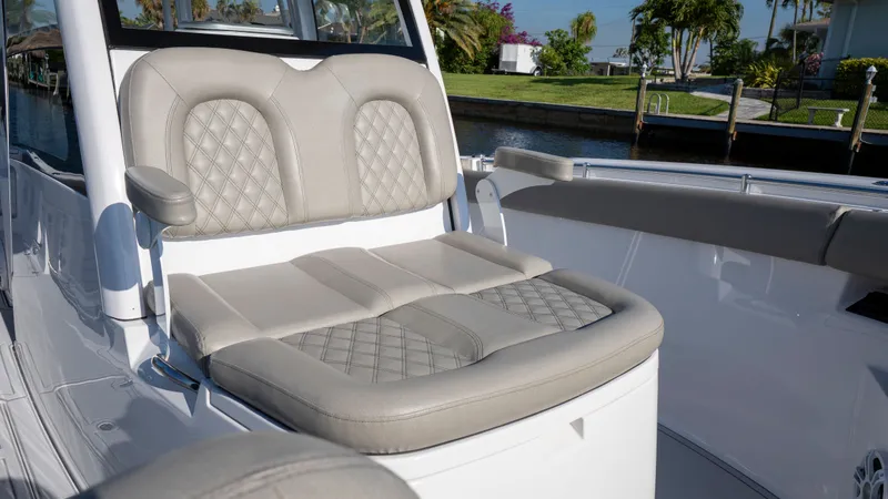 Slide: The Image of 2024 Sportsman Open 322 Center Console seating area, luxurious design. - 16