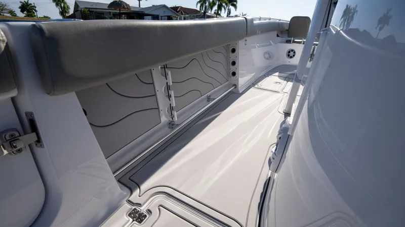 Slide: The Image of Interior view of Sportsman Open 322 Center Console 2024 boat deck. - 17