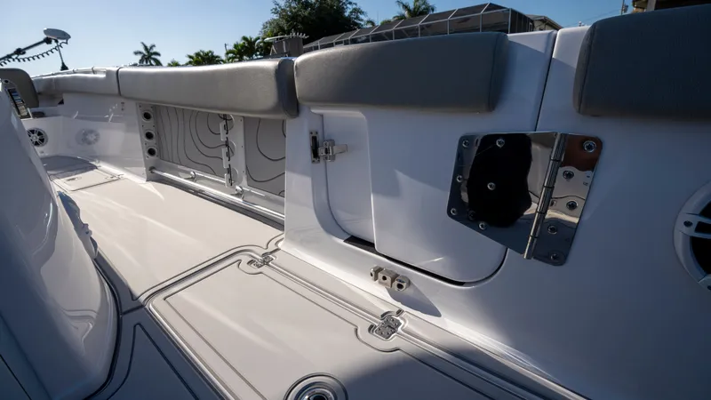 Slide: The Image of 2024 Sportsman Open 322 Center Console, interior view with seating area. - 18