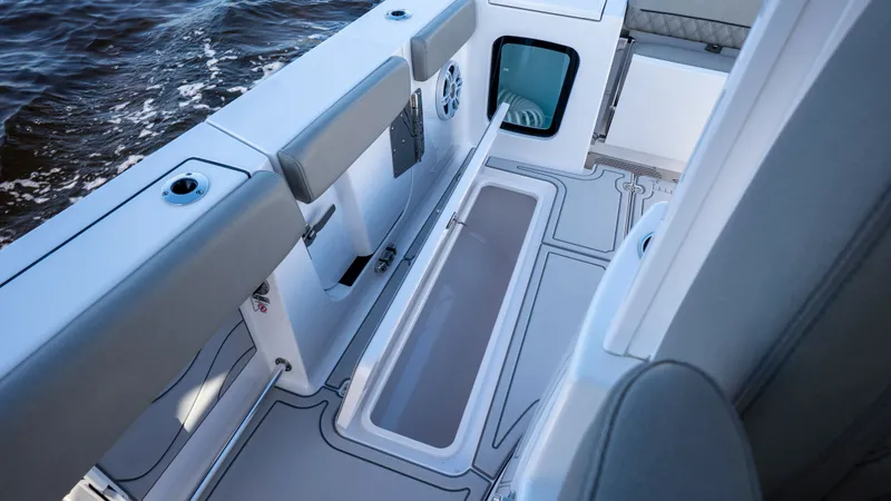 Slide: The Image of 2024 Sportsman Open 322 Center Console boat interior view. - 23