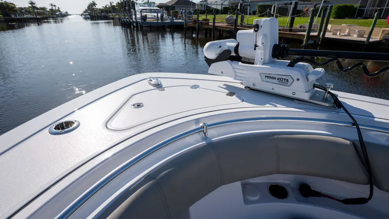 Slide: The Image of 2024 Sportsman Open 322 Center Console boat on calm water. - 24