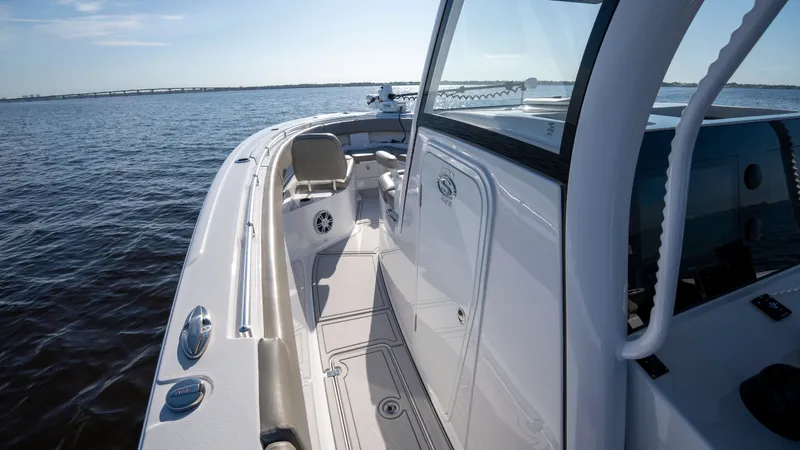 Slide: The Image of 2024 Sportsman Open 322 Center Console on calm waters. - 27