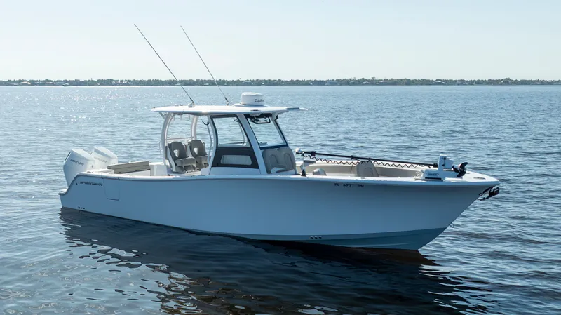 Slide: The Image of 2024 Sportsman Open 322 Center Console on calm water. - 3