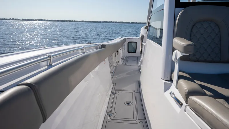 Slide: The Image of 2024 Sportsman Open 322 Center Console on calm waters. - 32