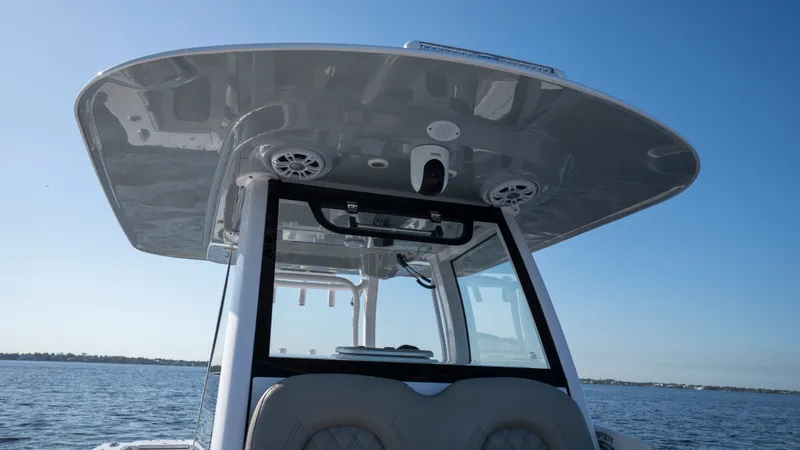 Slide: The Image of 2024 Sportsman Open 322 Center Console on the water. - 33