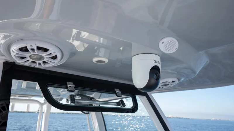Slide: The Image of Interior view of 2024 Sportsman Open 322 Center Console with speakers and camera. - 34