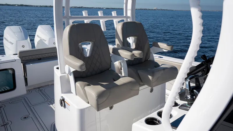 Slide: The Image of 2024 Sportsman Open 322 Center Console with luxurious seating on the water. - 38