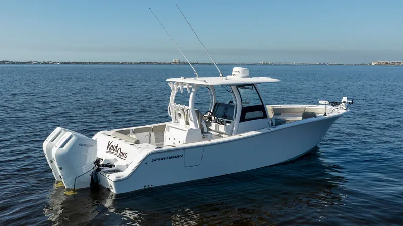 Slide: The Image of 2024 Sportsman Open 322 Center Console on calm waters. - 4