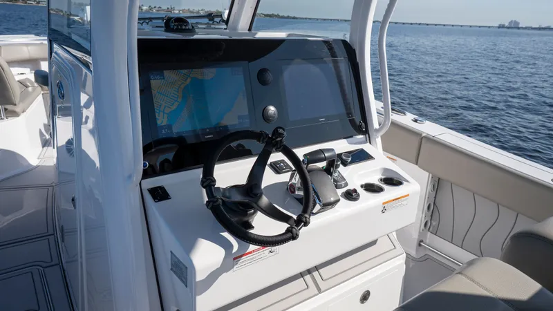 Slide: The Image of 2024 Sportsman Open 322 Center Console helm with navigation system. - 47