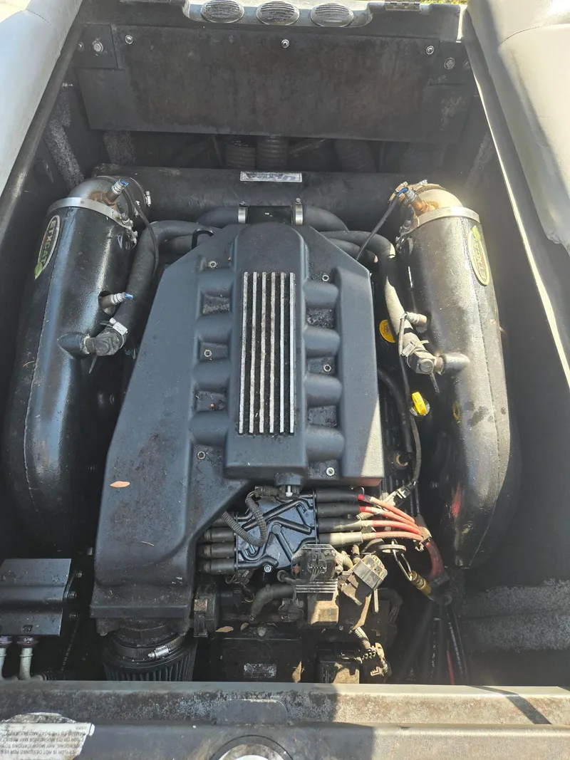 Slide: The Image of Engine of a 2009 Supra Launch 21 V boat, close-up view. - 12