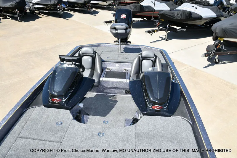 Slide: The Image of 2013 Ranger Z520c Dual Console boat in parking lot. - 12