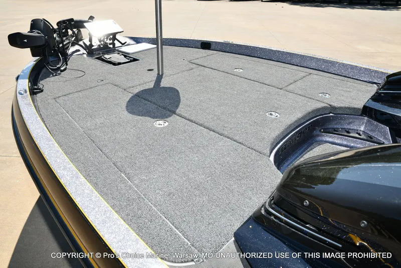 Slide: The Image of 2013 Ranger Z520c Dual Console boat deck with gray carpet. - 16