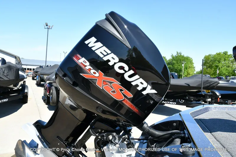 Slide: The Image of 2013 Ranger Z520c with Mercury ProXS engine in a parking lot. - 22