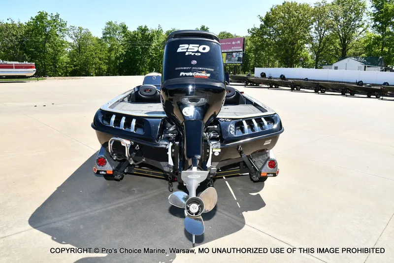 Slide: The Image of 2013 Ranger Z520c Dual Console boat on parking lot. - 28