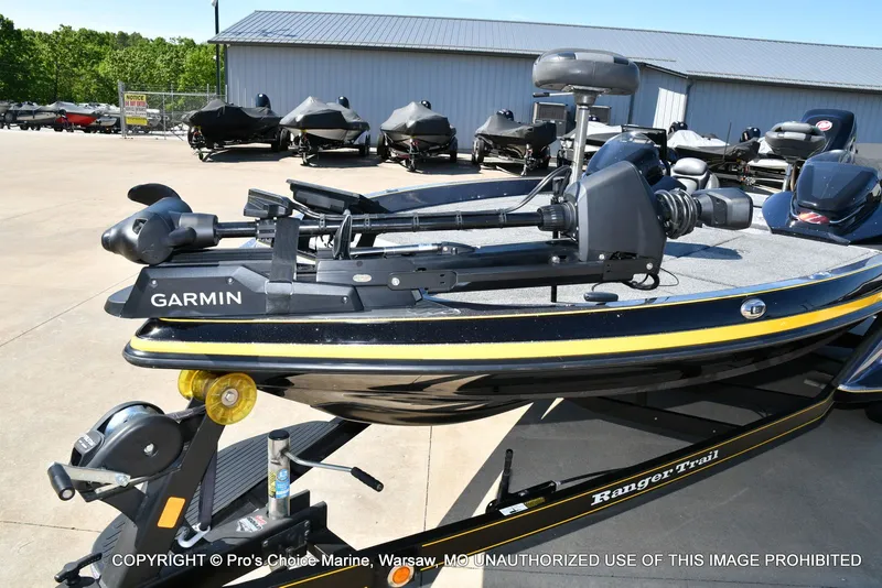 Slide: The Image of 2013 Ranger Z520c Dual Console with Garmin equipment on trailer. - 31