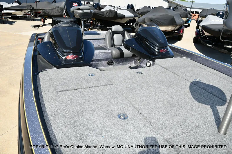 Slide: The Image of 2013 Ranger Z520c Dual Console boat with gray deck. - 40