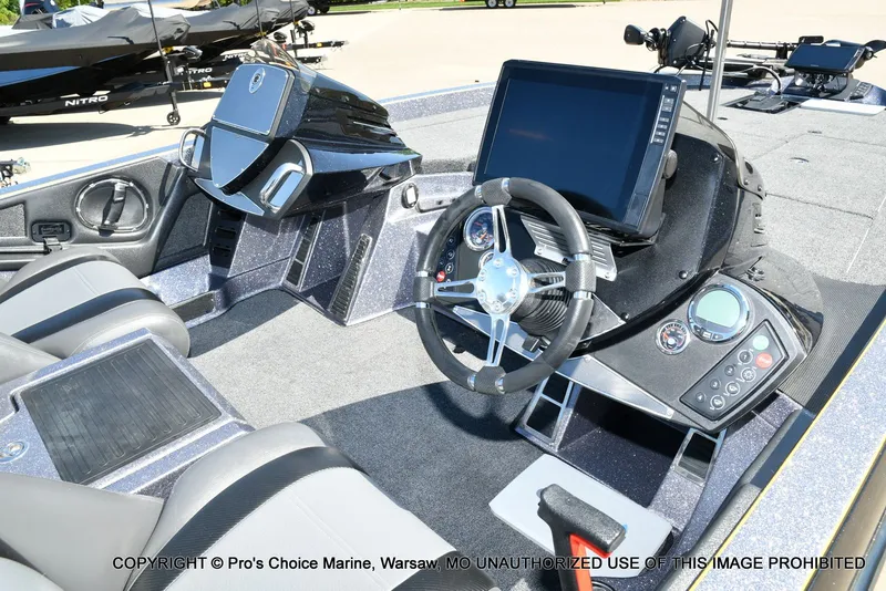 Slide: The Image of Interior of a 2013 Ranger Z520c Dual Console boat with steering console. - 43