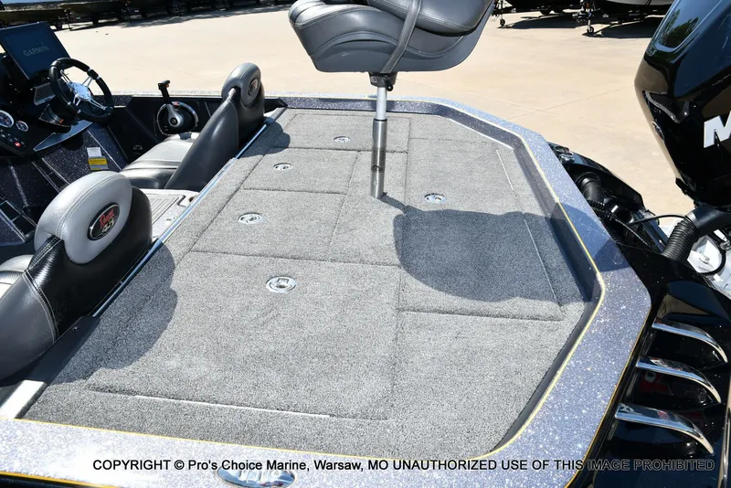 Slide: The Image of 2013 Ranger Z520c Dual Console boat interior with gray carpet. - 46