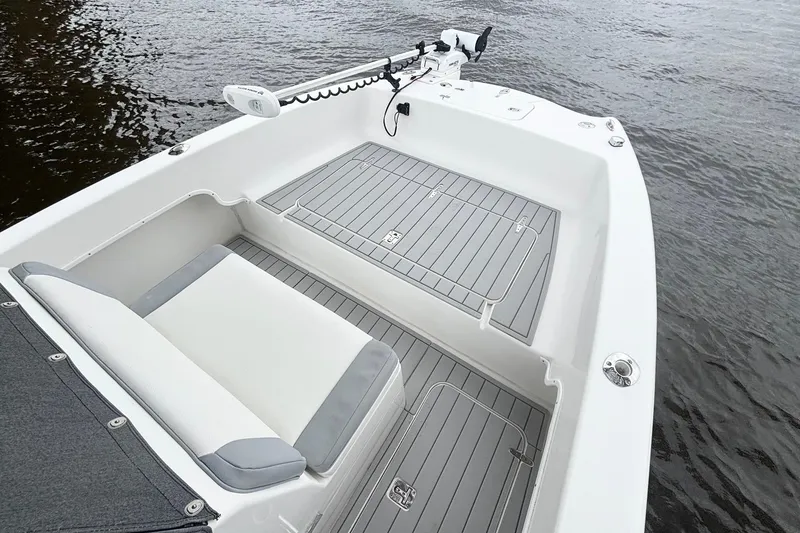 Slide: The Image of 2013 Prowler 25 boat deck with seating, featuring sleek design and modern amenities. - 15