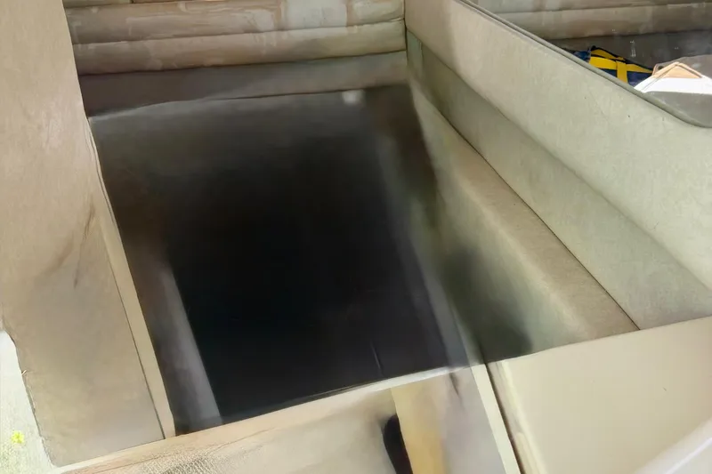 Slide: The Image of Interior seating area of a 1997 Sea Ray 270 Sundancer boat. - 19