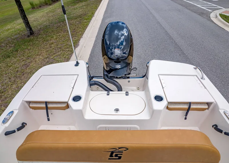 Slide: The Image of 2026 Carolina Skiff 17 LS boat with outboard motor. - 11