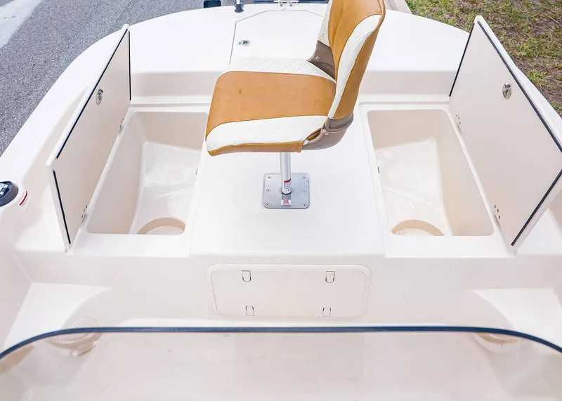 Slide: The Image of Interior of 2026 Carolina Skiff 17 LS with seat and storage compartments. - 23