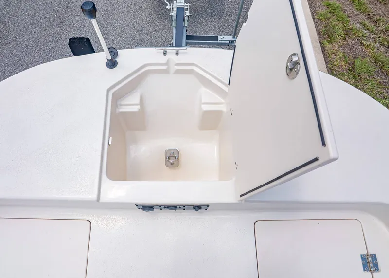 Slide: The Image of Open storage compartment on Carolina Skiff 17 LS boat, 2026 model. - 25