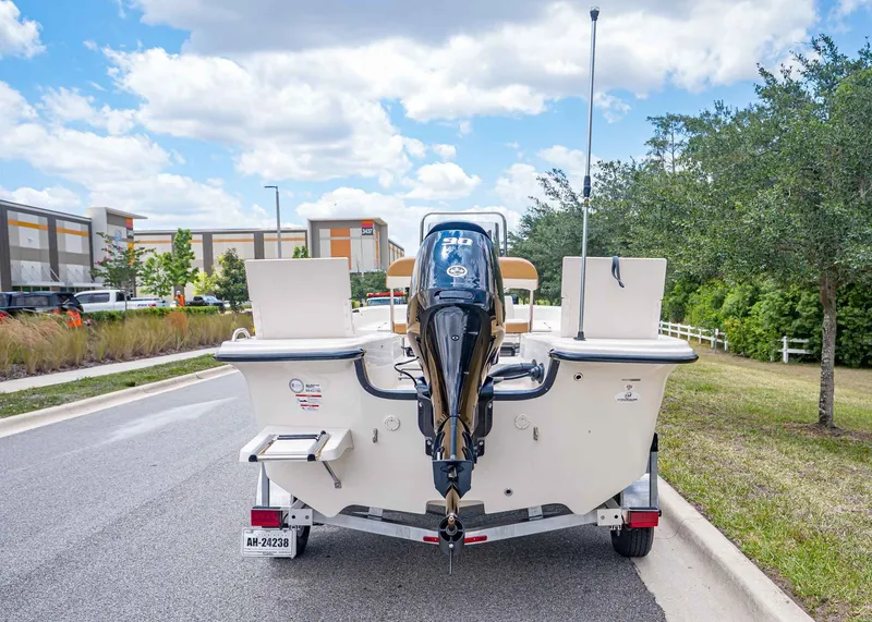 Slide: The Image of Rear view of a 2026 Carolina Skiff 17 LS boat on trailer. - 4
