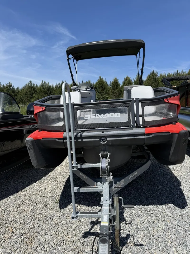 Slide: The Image of 2023 Sea-Doo Switch Sport 21-foot, 230HP on trailer. - 2