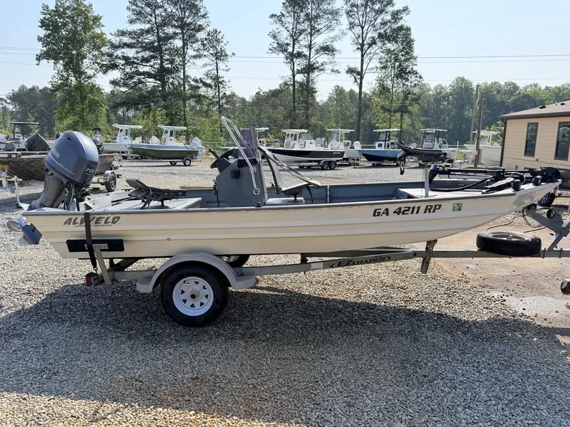 The Image of 2016 Alweld Marsh Console Series boat with Yamaha 70 engine. - 1