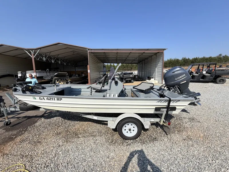 Slide: The Image of 2016 Alweld Marsh Console boat with Yamaha 70 engine on trailer. - 3