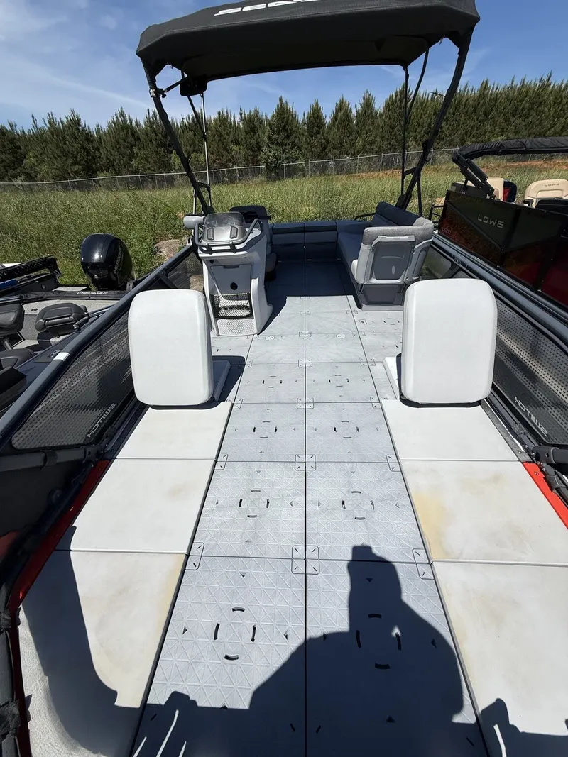 Slide: The Image of Interior view of 2023 Sea-Doo Switch Sport 21-foot boat. - 4