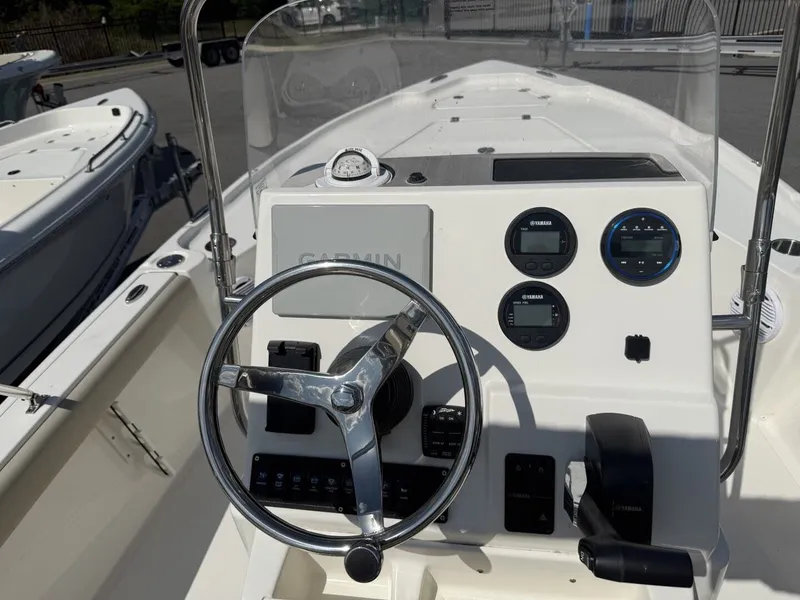 Slide: The Image of Key West 188 Bay Reef 2026 helm with Garmin display. - 12