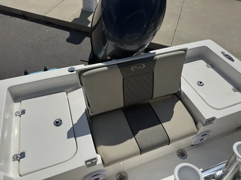 Slide: The Image of Rear seating of 2026 Key West 188 Bay Reef with storage compartments. - 9