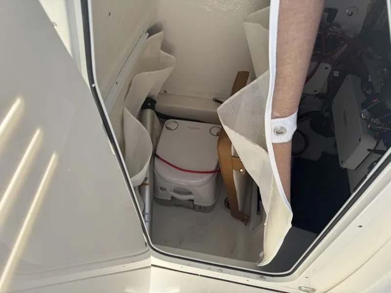 Slide: The Image of Interior of Key West 239 FSR 2026 featuring portable toilet. - 18