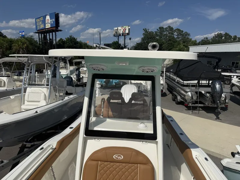 Slide: The Image of Key West 239 FSR boat, 2026 model, parked outdoors. - 22